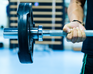 man lifting weights